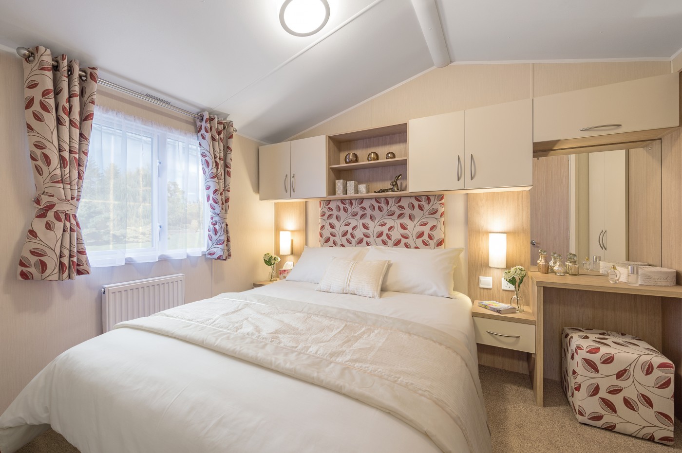 The 2016 Willerby Brockenhurst offers views of the grassy park from the large windows. It has two bedrooms and an open plan kitchen/living room layout. 
Bedroom 1 – Double
Bedroom 2 – Twin